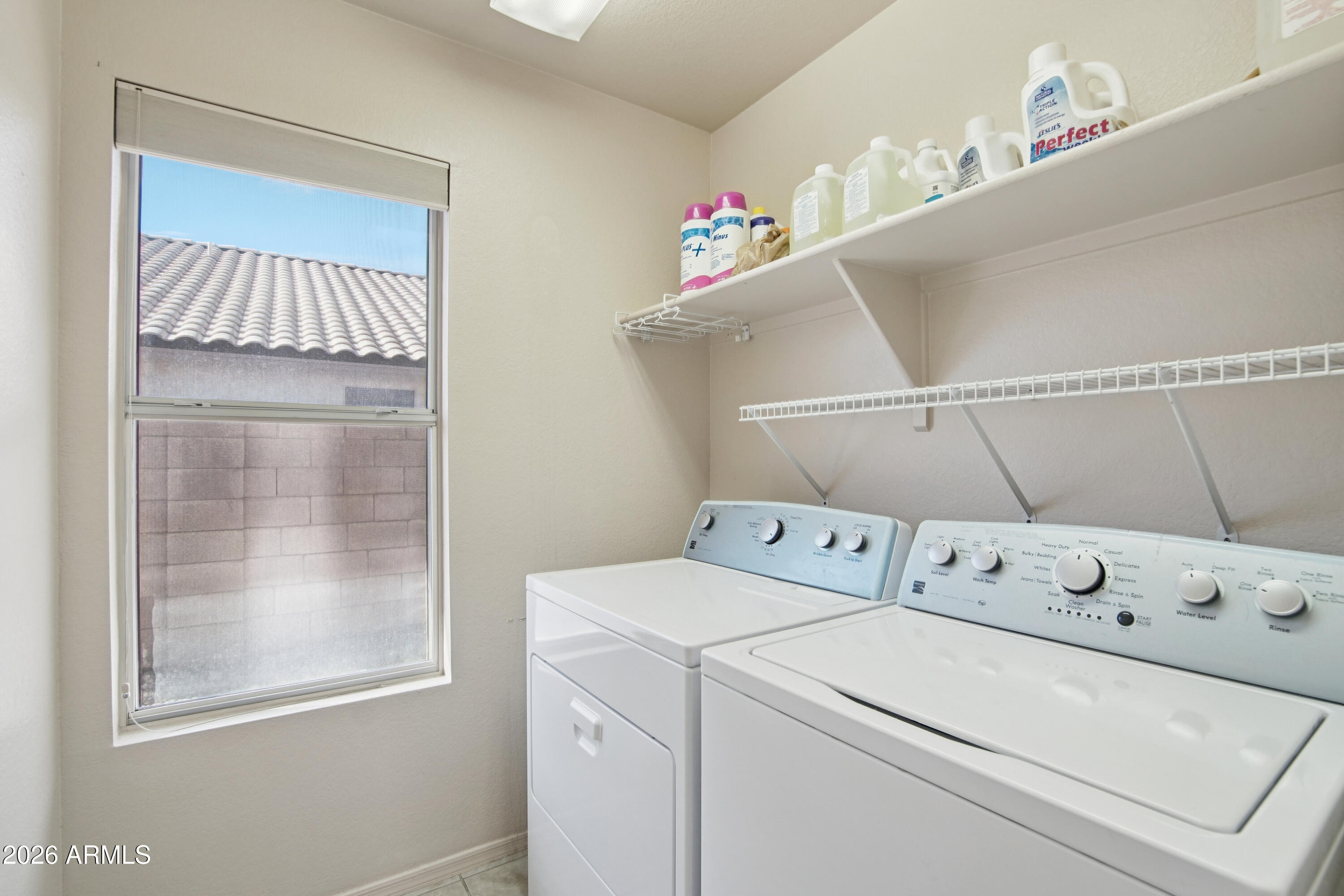 9729 West Burnett Road Peoria, AZ 85382 - Photo 22 of 29 a utility room with dryer and washer