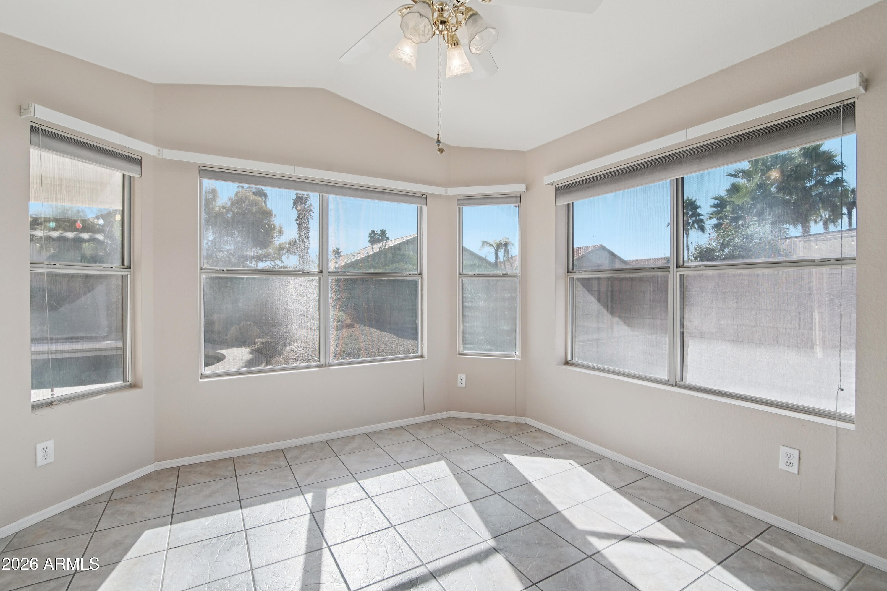 9729 West Burnett Road Peoria, AZ 85382 - Photo 23 of 29 a view of an empty room with a window