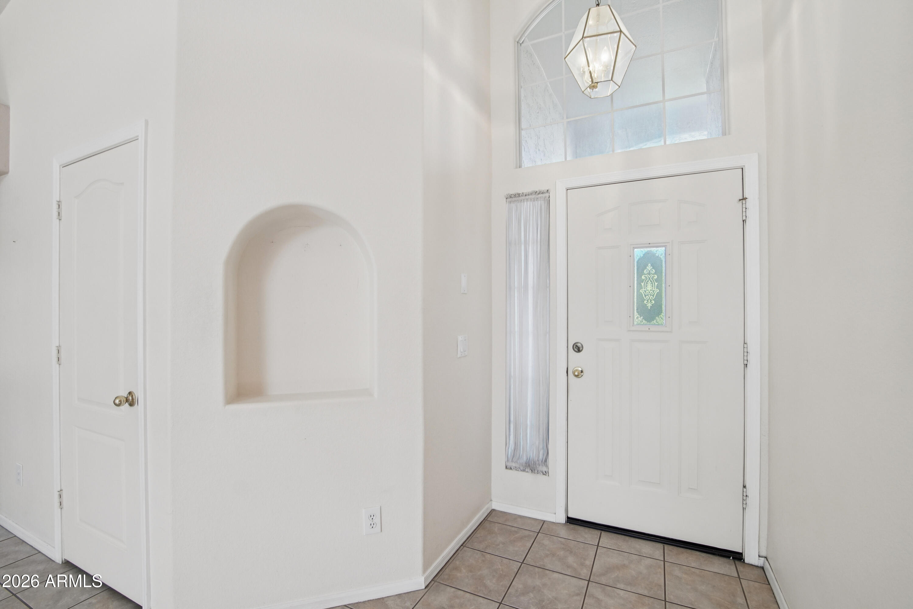 9729 West Burnett Road Peoria, AZ 85382 - Photo 4 of 29 a view of cabinet with mirror