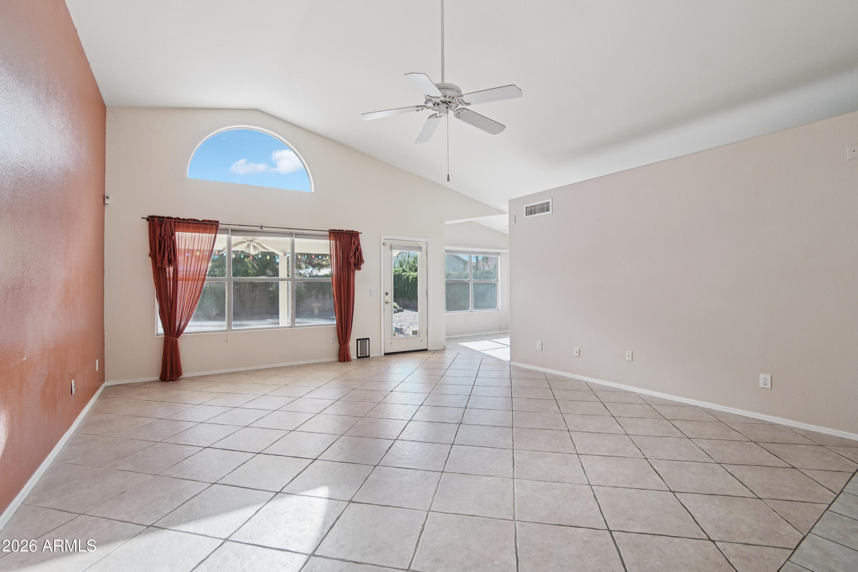 9729 West Burnett Road Peoria, AZ 85382 - Photo 5 of 29 a view of an empty room with a window