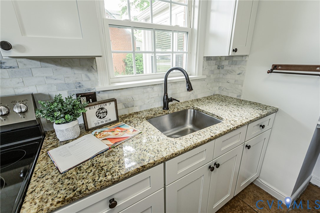1312 Santa Rosa Road Henrico, VA 23229 - Photo 22 of 54 Kitchen featuring a Stainless Steel Sink with a ma