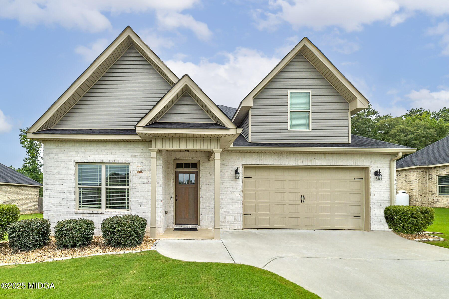 519 Barbara Court Forsyth, GA 31029 - Photo 1 of 39 front view of a house and a yard