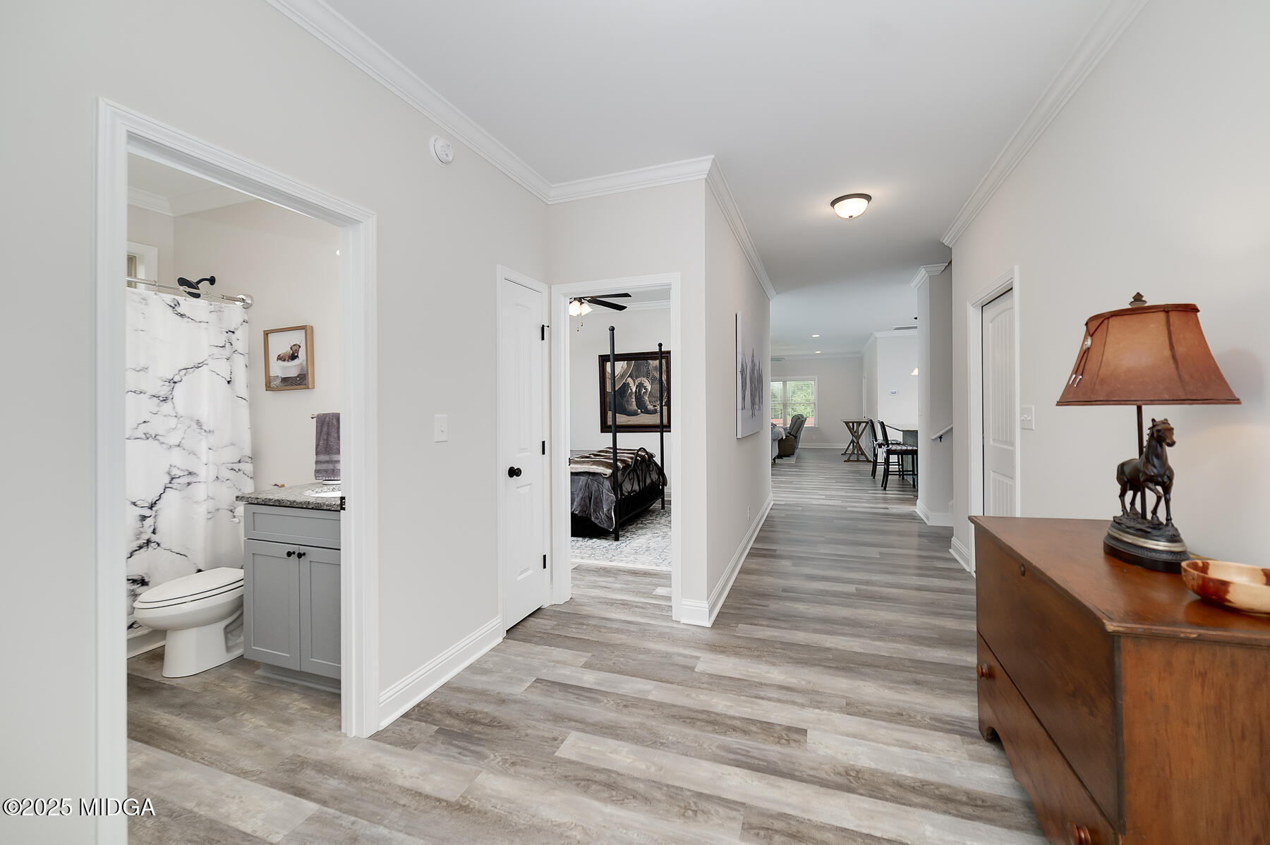 519 Barbara Court Forsyth, GA 31029 - Photo 12 of 39 a living room with furniture and a wooden floor