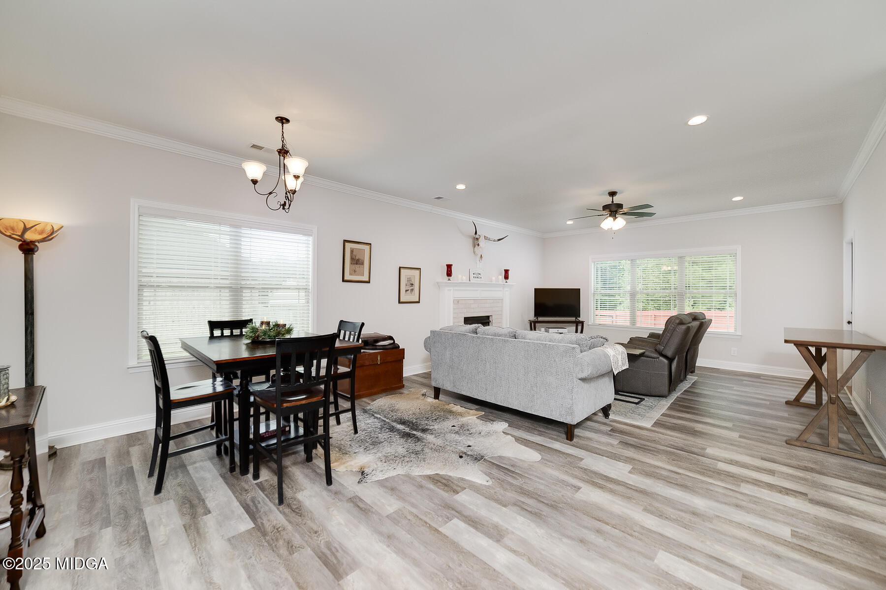 519 Barbara Court Forsyth, GA 31029 - Photo 13 of 39 a living room with furniture and a wooden floor
