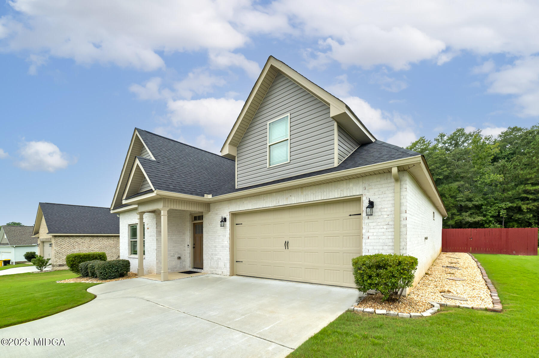 519 Barbara Court Forsyth, GA 31029 - Photo 2 of 39 a view of a house with a yard