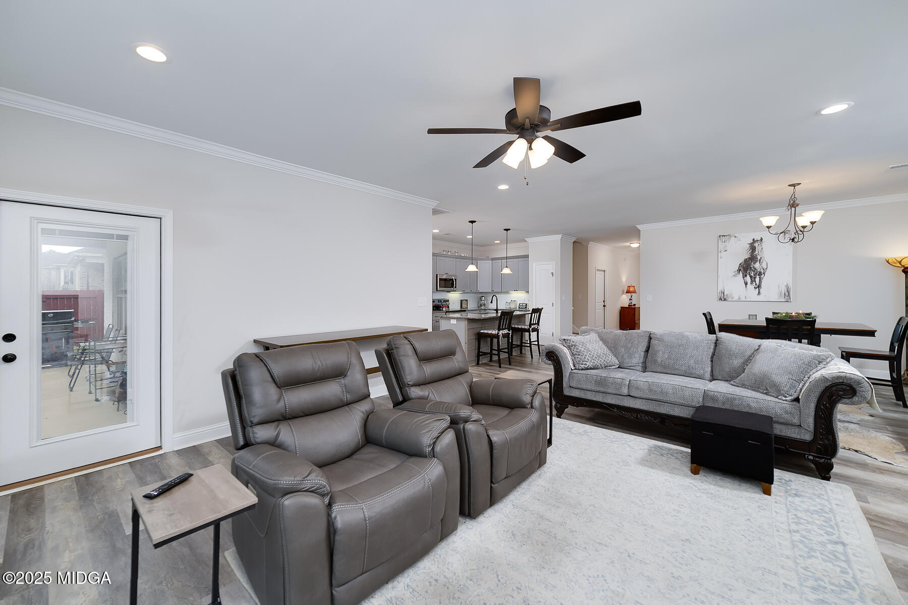 519 Barbara Court Forsyth, GA 31029 - Photo 23 of 39 a living room with furniture and a ceiling fan