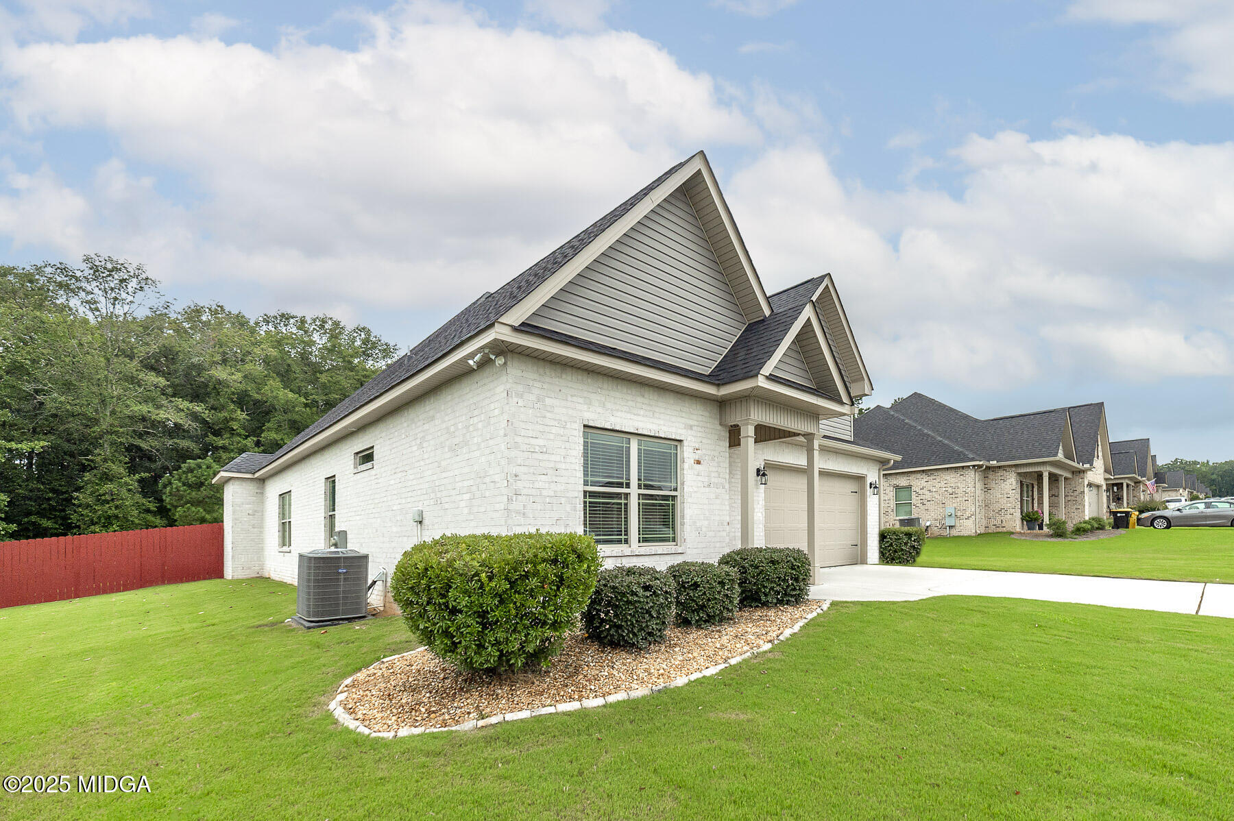 519 Barbara Court Forsyth, GA 31029 - Photo 3 of 39 a view of a house with a yard
