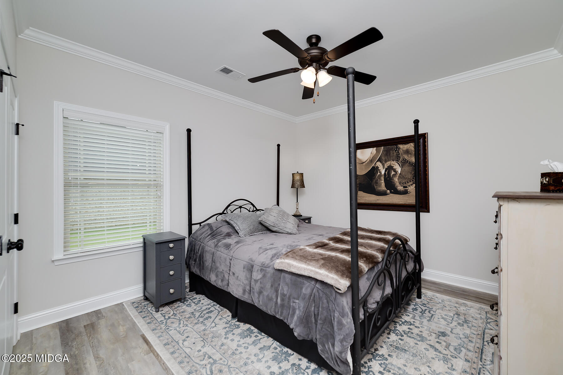 519 Barbara Court Forsyth, GA 31029 - Photo 31 of 39 a bedroom with a bed and a large window