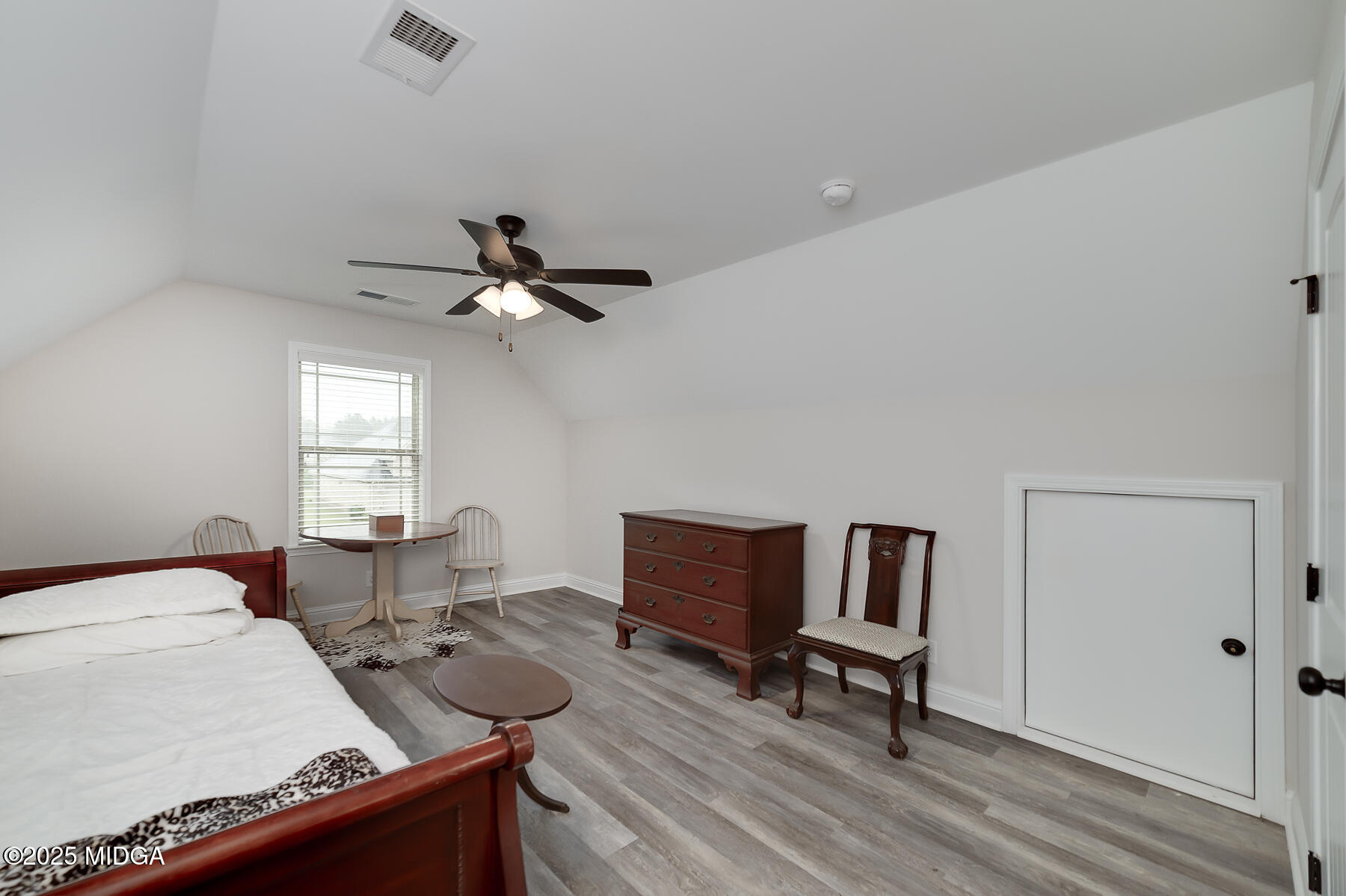 519 Barbara Court Forsyth, GA 31029 - Photo 33 of 39 a living room with furniture and a window