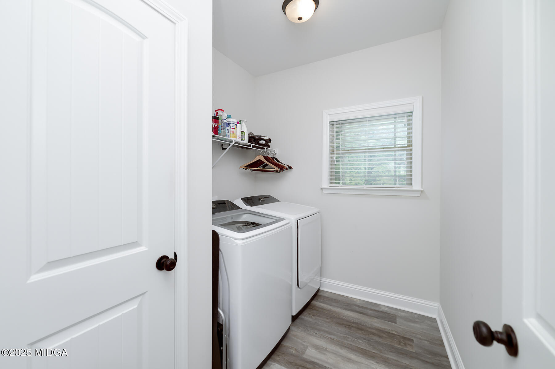 519 Barbara Court Forsyth, GA 31029 - Photo 36 of 39 a view of a storage & utility room with a window