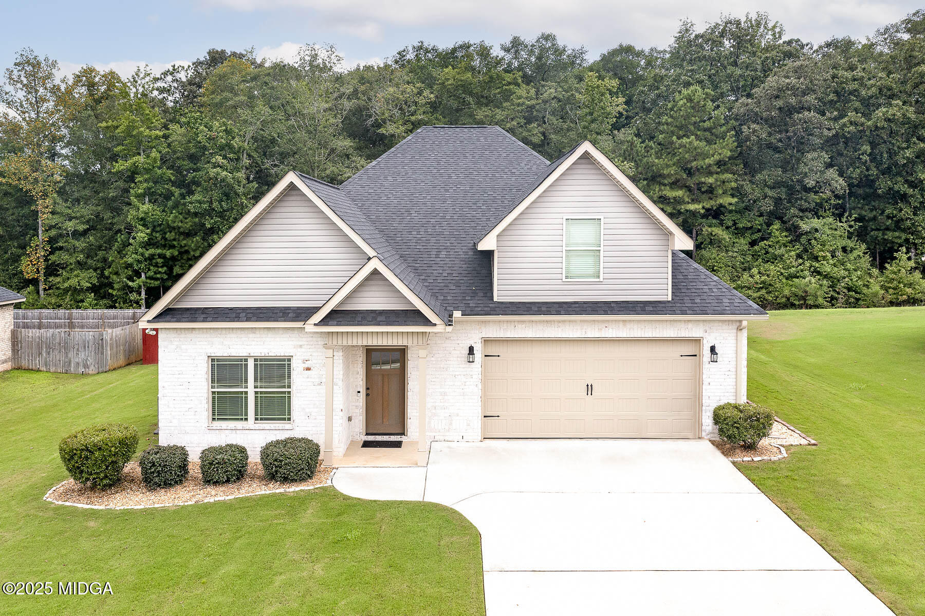 519 Barbara Court Forsyth, GA 31029 - Photo 37 of 39 a house view with a garden space