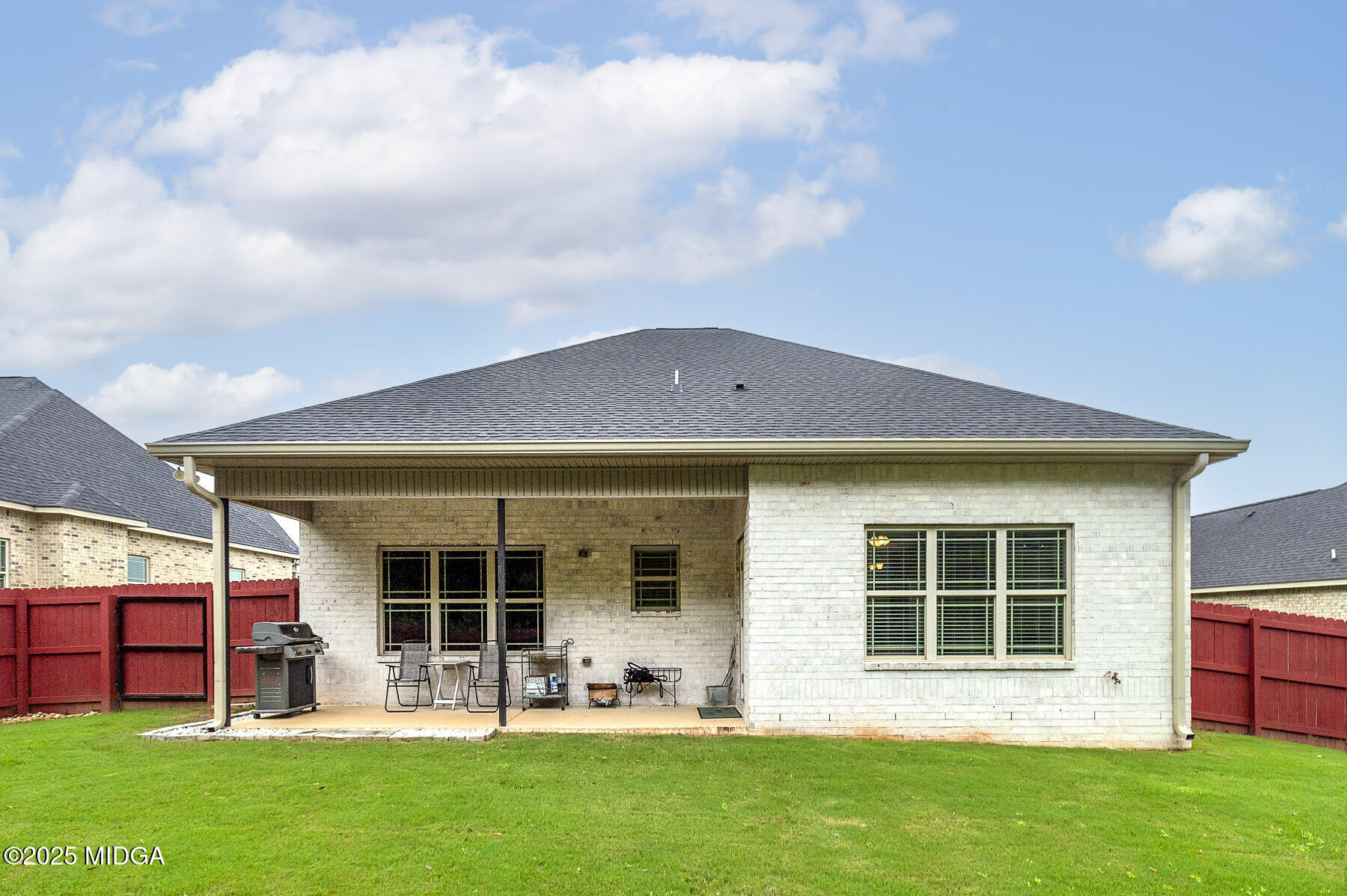 519 Barbara Court Forsyth, GA 31029 - Photo 4 of 39 front view of a house with a yard