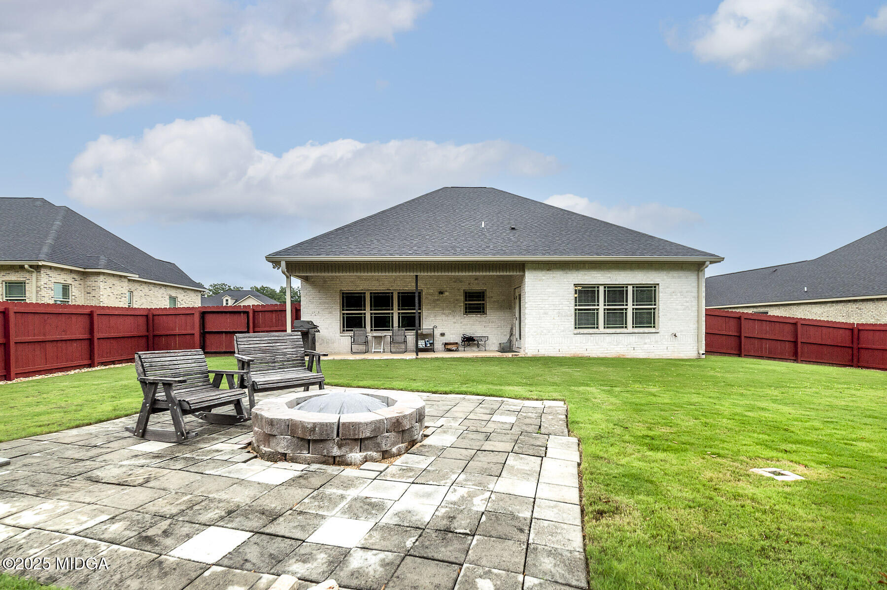 519 Barbara Court Forsyth, GA 31029 - Photo 6 of 39 a view of house with a yard and sitting area