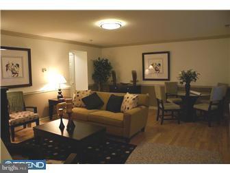 1605 West 7th Street Chester, PA 19013 - Photo 2 of 11 a living room with furniture and a window