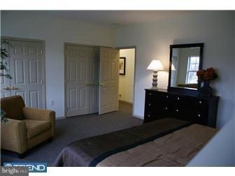 1605 West 7th Street Chester, PA 19013 - Photo 5 of 11 a living room with furniture and a lamp