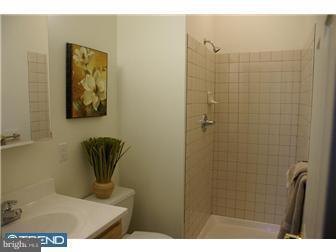 1605 West 7th Street Chester, PA 19013 - Photo 6 of 11 a bathroom with a toilet and a shower