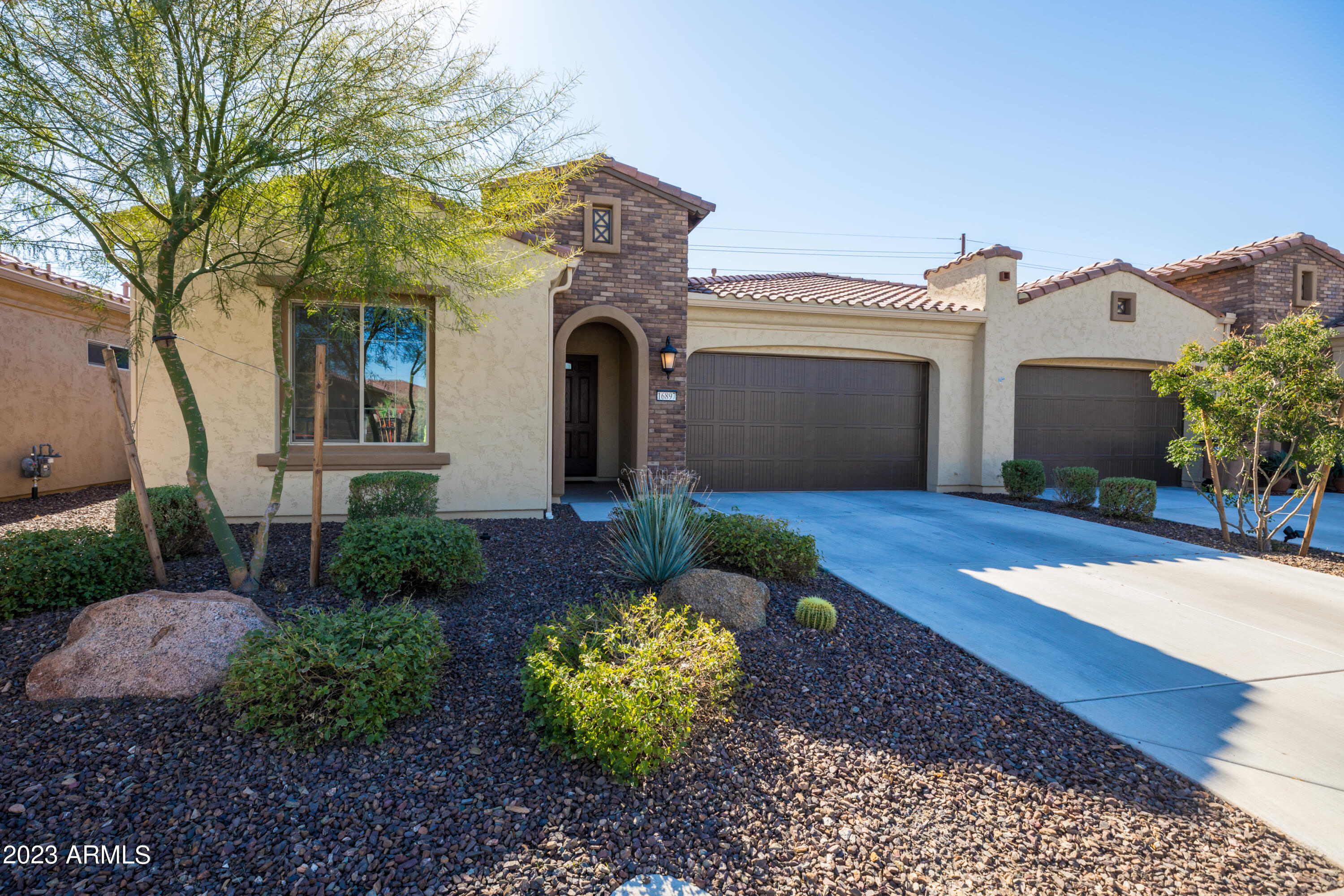 16897 West Merrell Street Goodyear, AZ 85395 - Photo 1 of 58 16897 front facade sign side