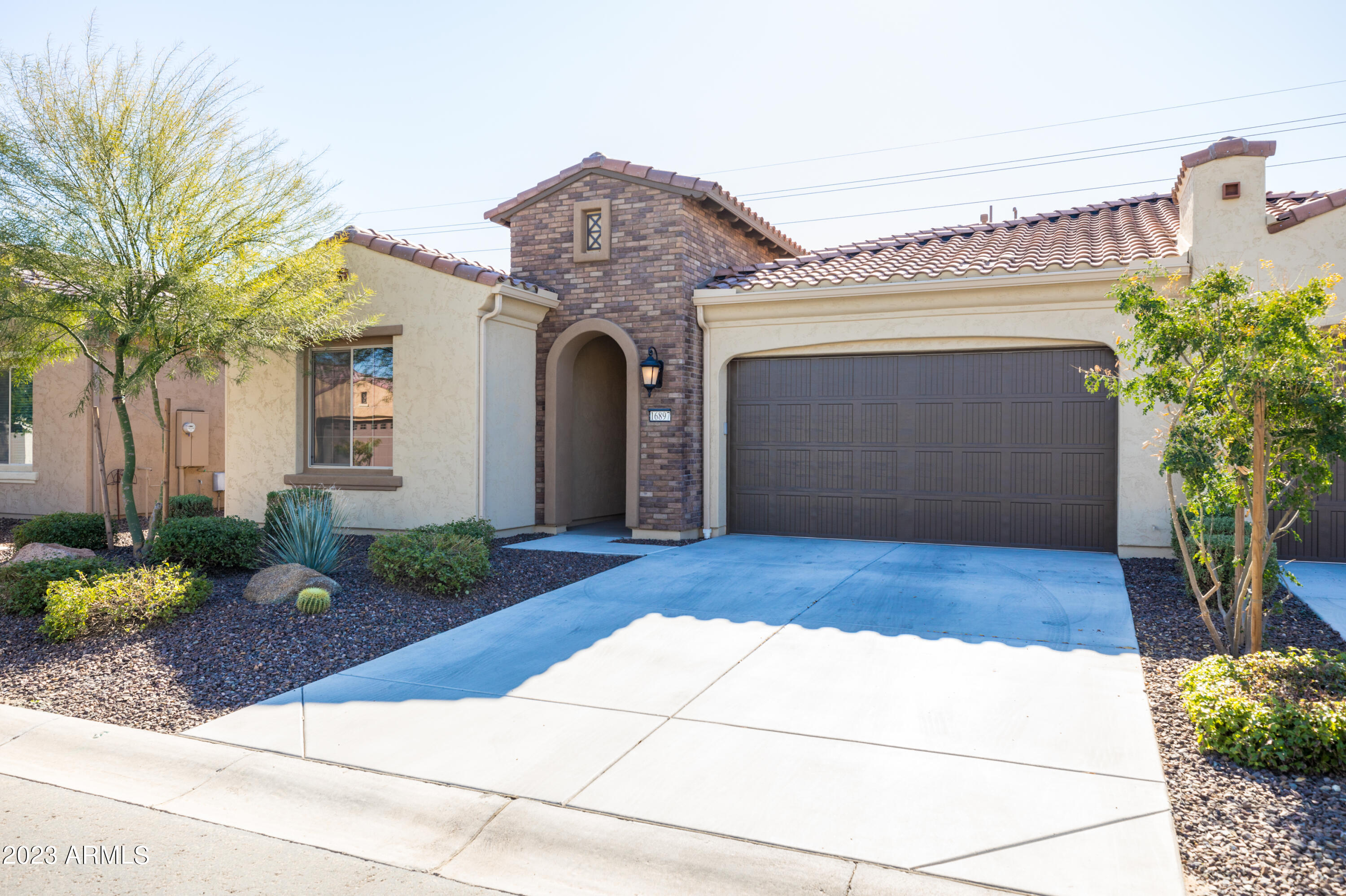 16897 West Merrell Street Goodyear, AZ 85395 - Photo 3 of 58 16897 front facade garage side