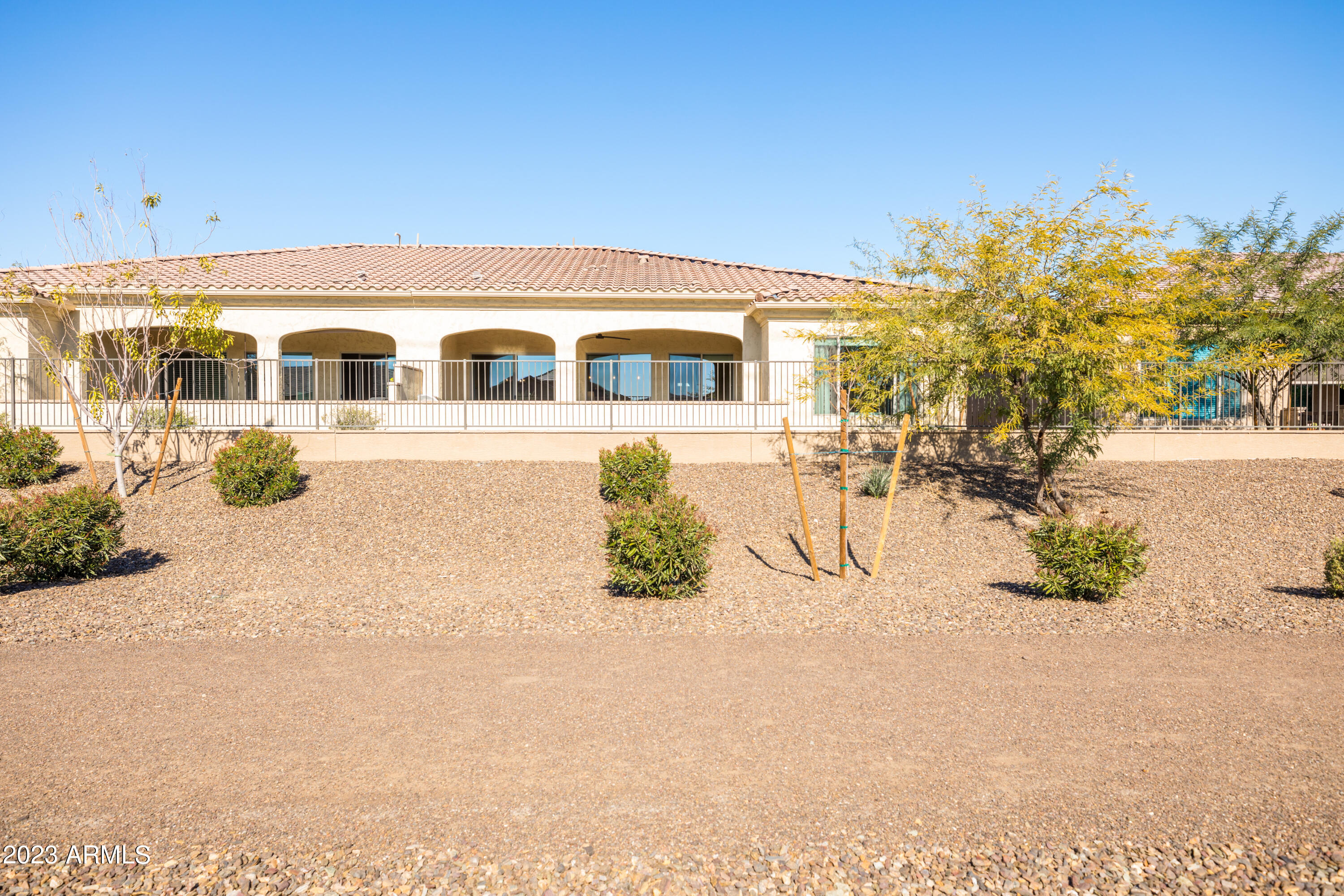16897 West Merrell Street Goodyear, AZ 85395 - Photo 39 of 58 16897 behind townhouse looking at it