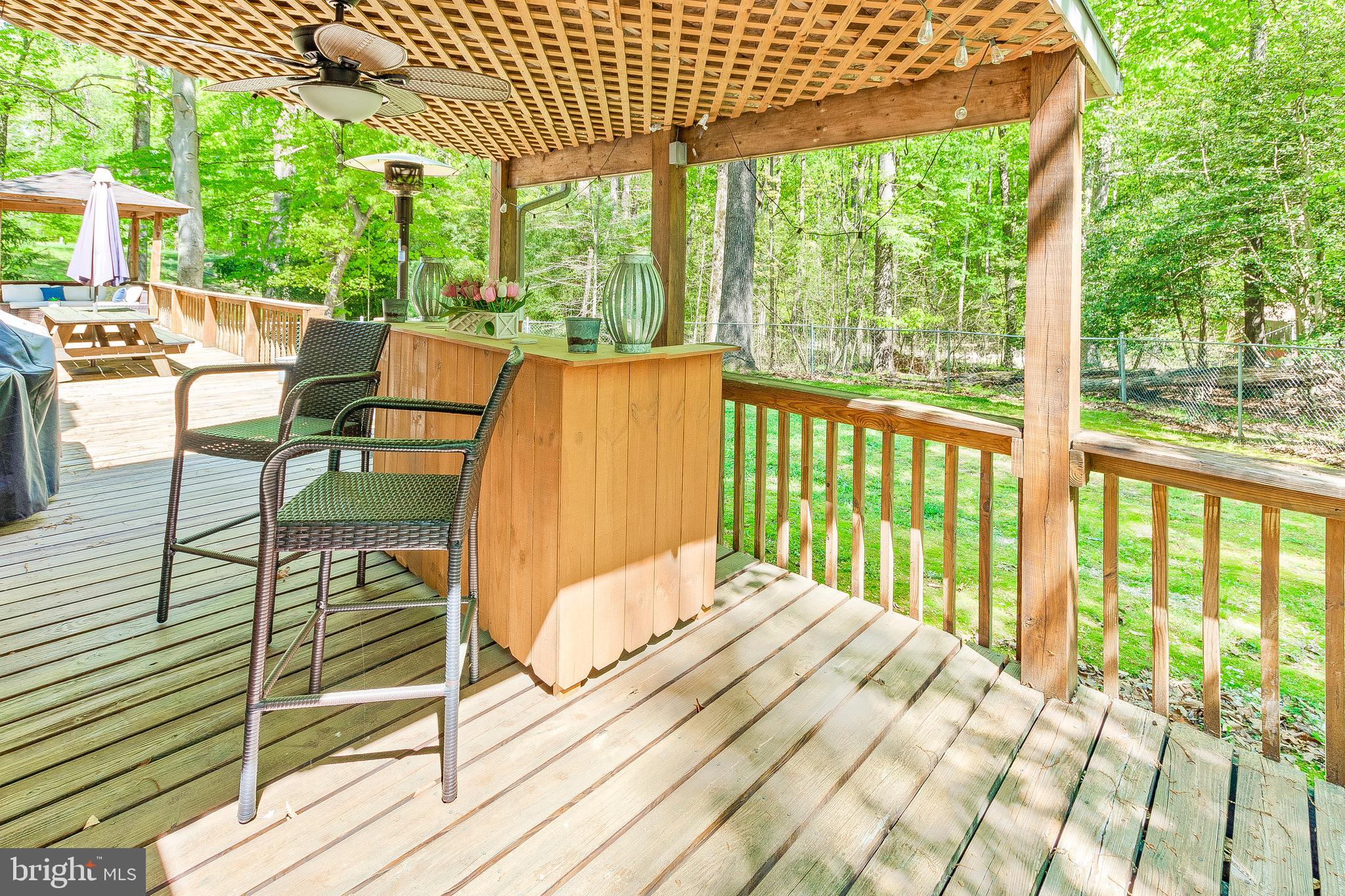 7290 Simms Landing Road Port Tobacco, MD 20677 - Photo 52 of 74 Covered Porch on deck overlooking back yard