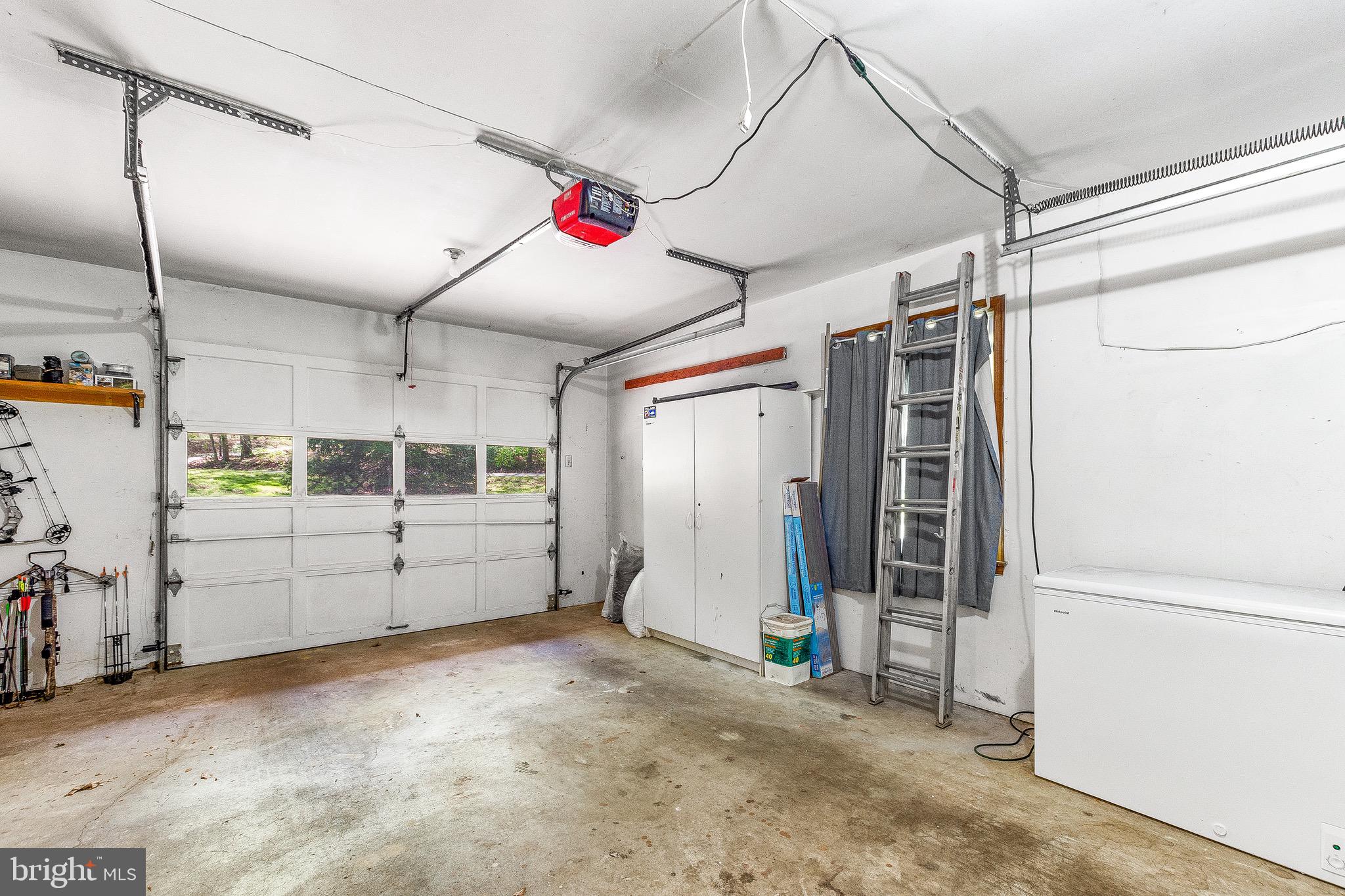 7290 Simms Landing Road Port Tobacco, MD 20677 - Photo 60 of 74 One car spacious garage w/new opener