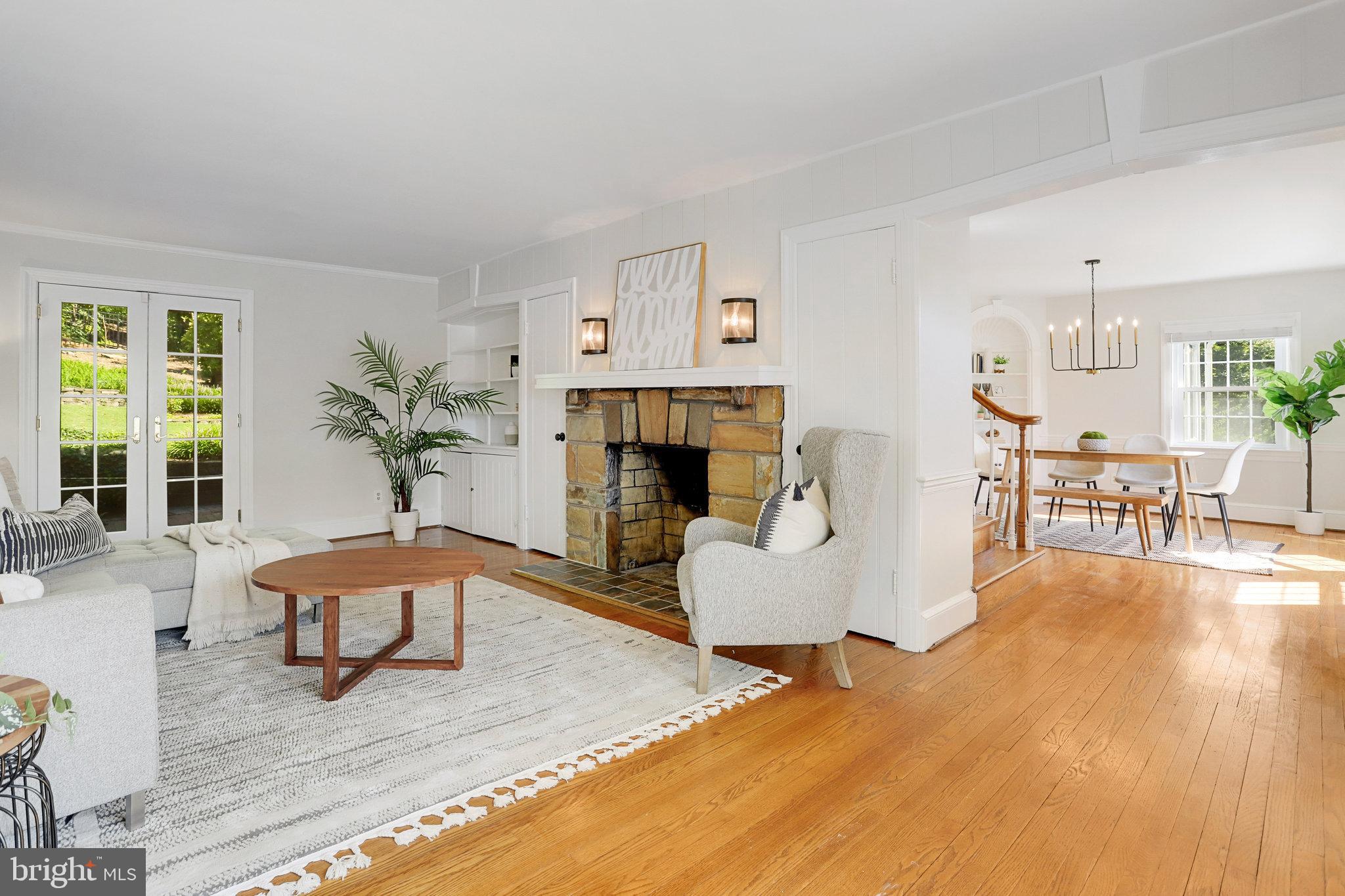 3424 Woodside Road Alexandria, VA 22310 - Photo 12 of 56 a stone-front wood-burning fireplace