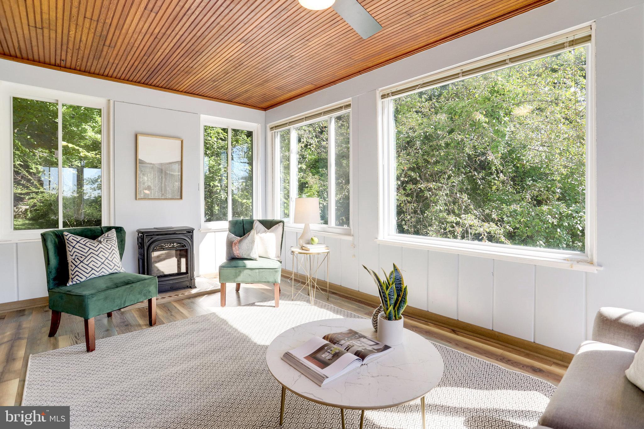 3424 Woodside Road Alexandria, VA 22310 - Photo 23 of 56 Wall of windows in the family room/sunroom
