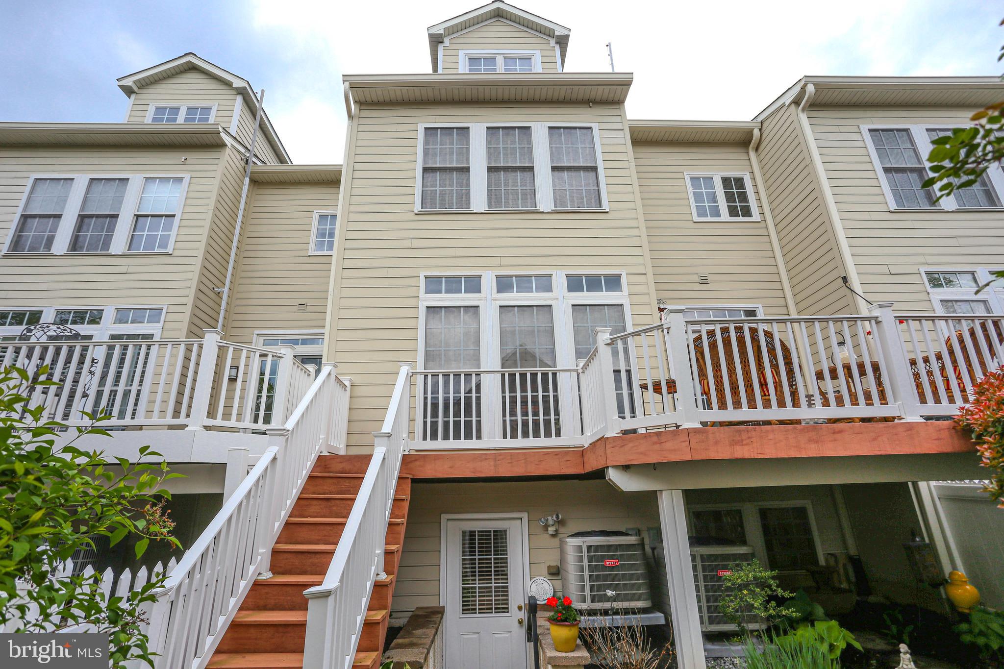 13 Doyle Street Doylestown, PA 18901 - Photo 37 of 39 rear deck & walk-out from family room