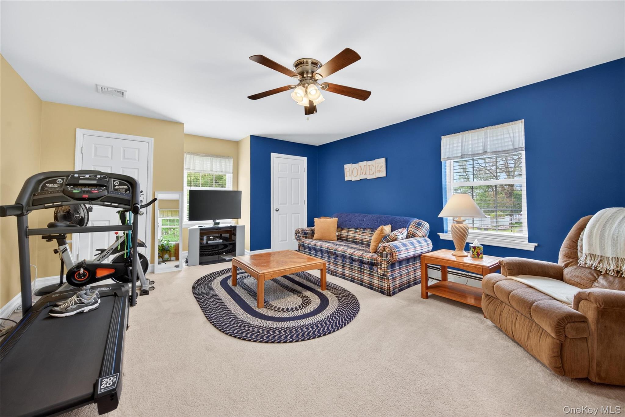 19 Pirog Road Pine Bush, NY 12566 - Photo 31 of 50 a living room with furniture a fireplace and a window