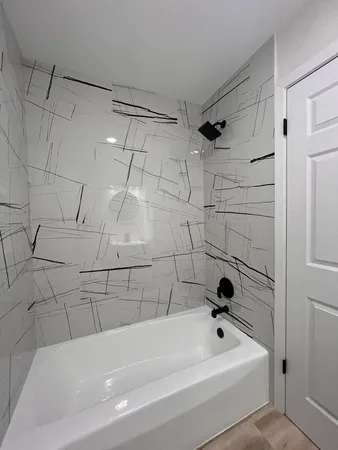 a bathroom with a bathtub