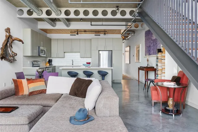 a kitchen with a sink stove and microwave