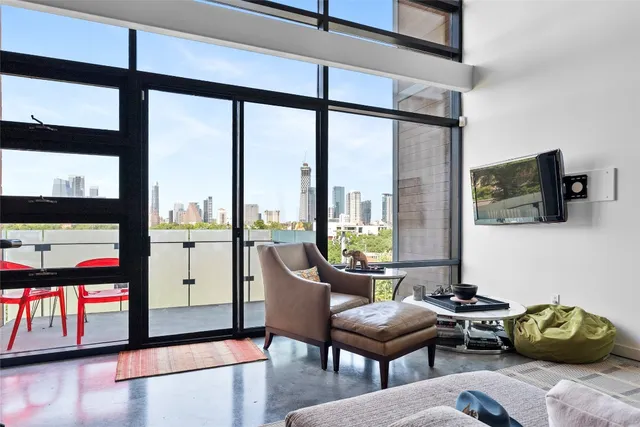 a kitchen with a sink cabinets and appliances