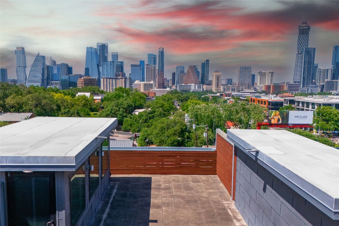 1401 Eva Street, Unit 406 Austin, TX 78704 - Photo 2 of 32 a view of a city from a roof deck