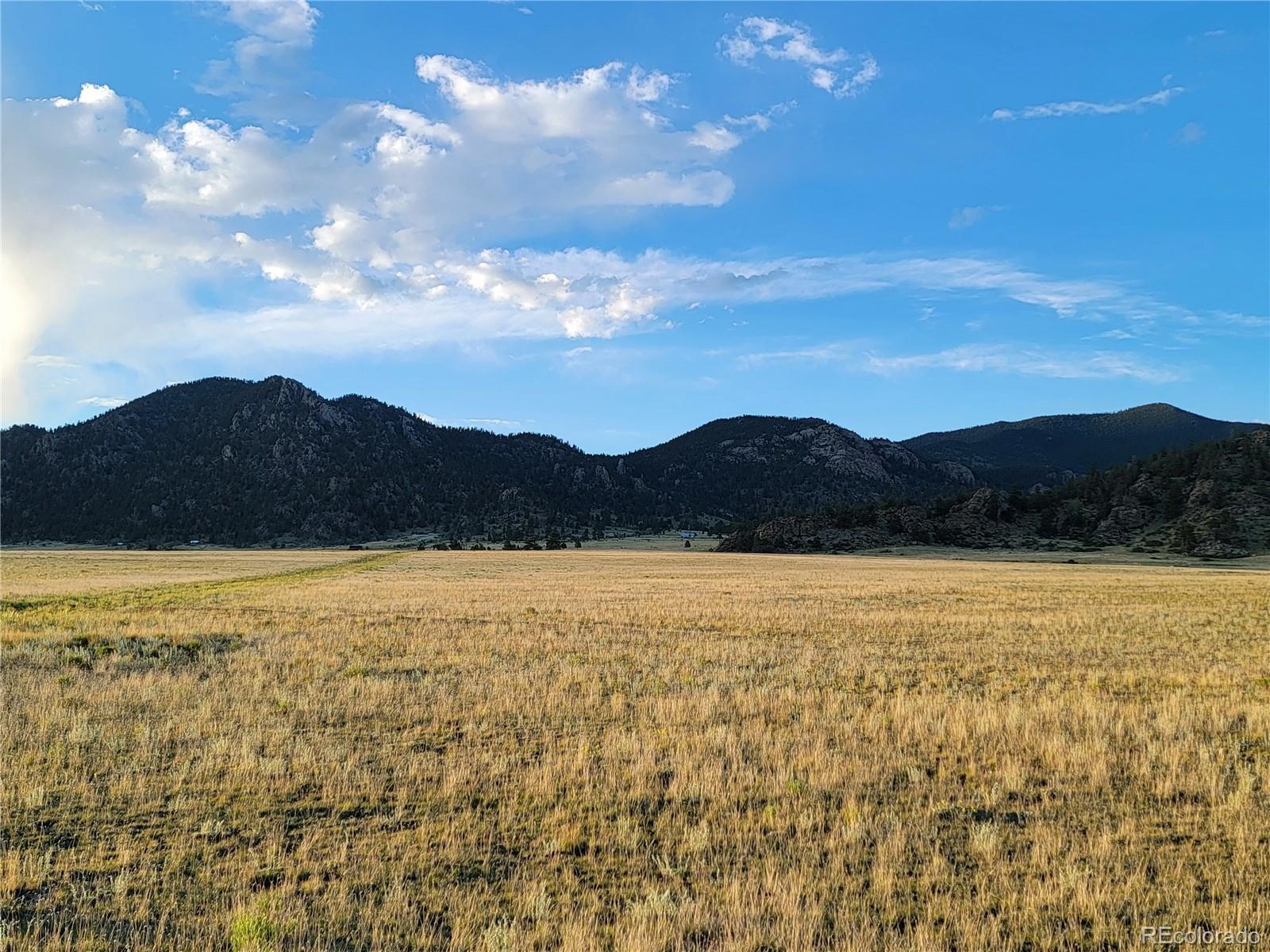 6065 Mesa Road Hartsel, CO 80449 - Photo 2 of 21 a view of an ocean and a mountain