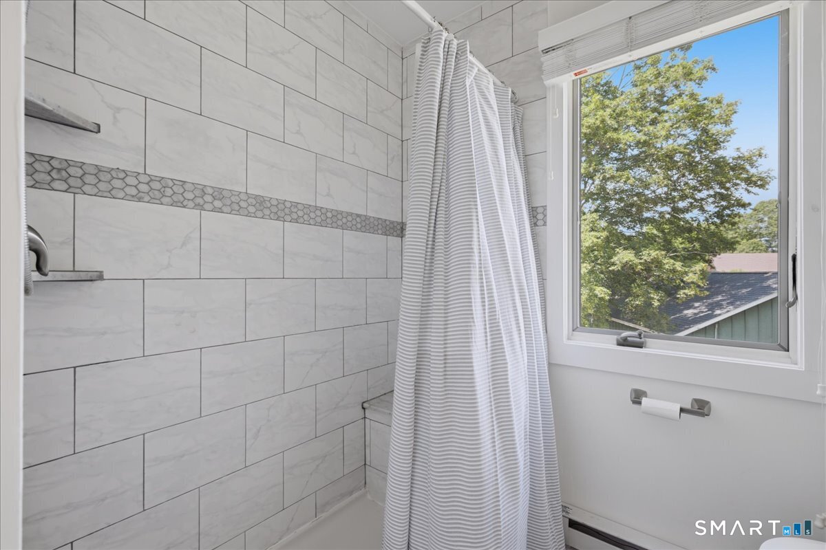 85 River Road, Unit M5 Essex, CT 06426 - Photo 23 of 35 Tiled shower