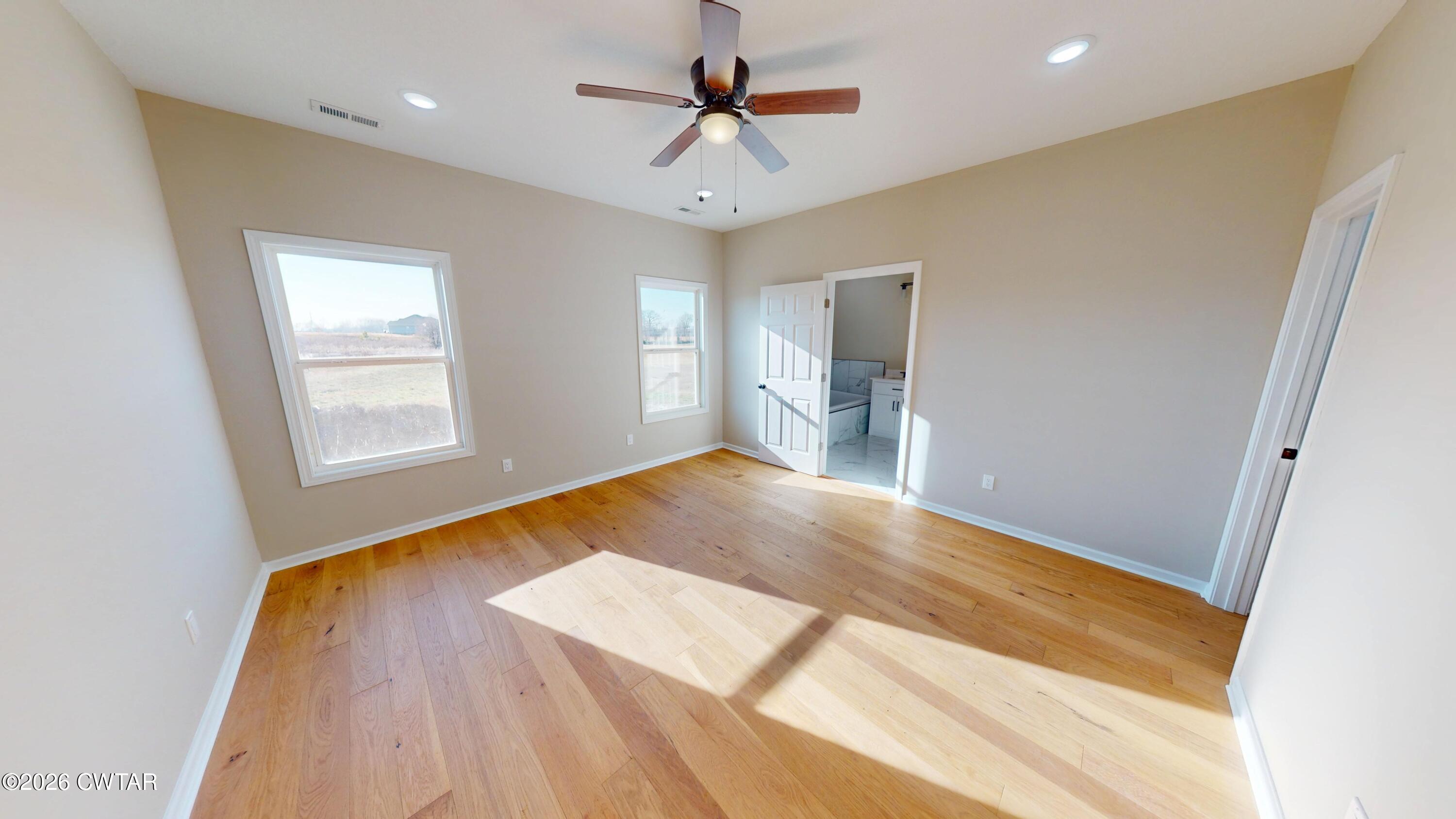 1360 Bonicord Road Dyersburg, TN 38024 - Photo 14 of 31 a view of an empty room with a window