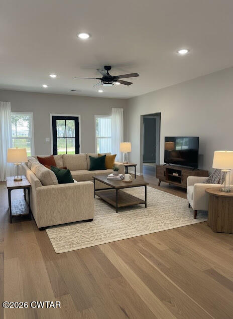 1360 Bonicord Road Dyersburg, TN 38024 - Photo 2 of 31 a living room with furniture and a flat screen tv