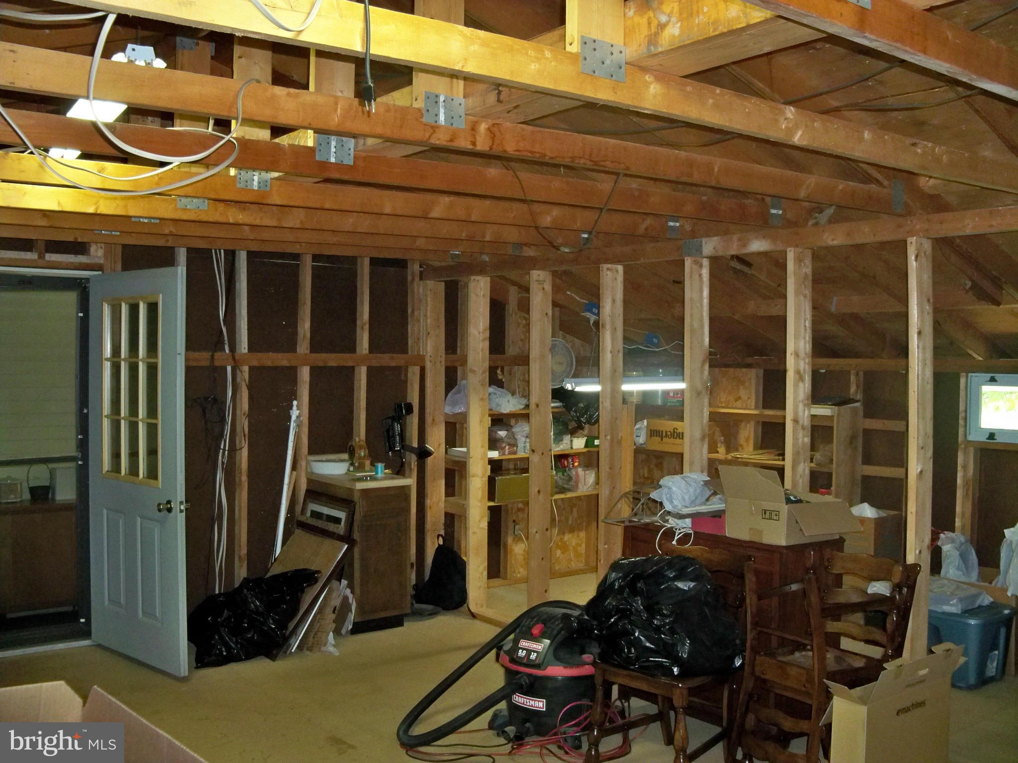 160 Almost Heaven Road Falling Waters, WV 25419 - Photo 24 of 30 a view of a room with gym equipment