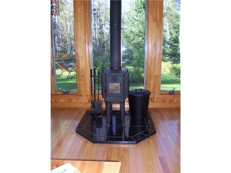 71 Birch Ridge Road Machias, ME 04654 - Photo 10 of 26 Other. New Sunroom with woodstove
