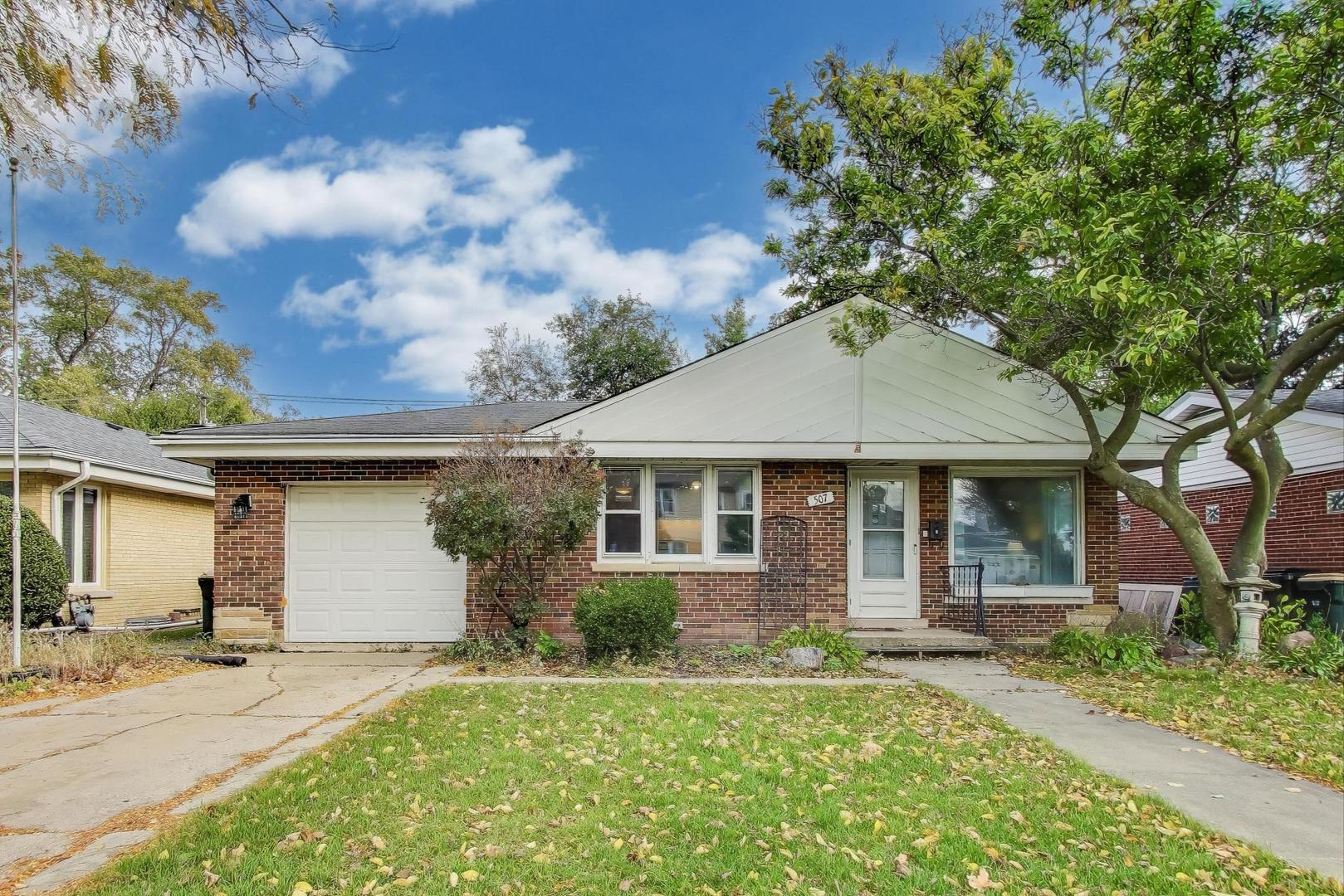 507 North Hamlin Avenue Park Ridge, IL 60068 - Photo 1 of 30 front view of house with a yard