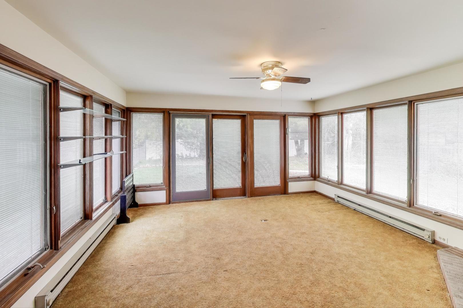 507 North Hamlin Avenue Park Ridge, IL 60068 - Photo 11 of 30 wooden floor in an empty room with a window