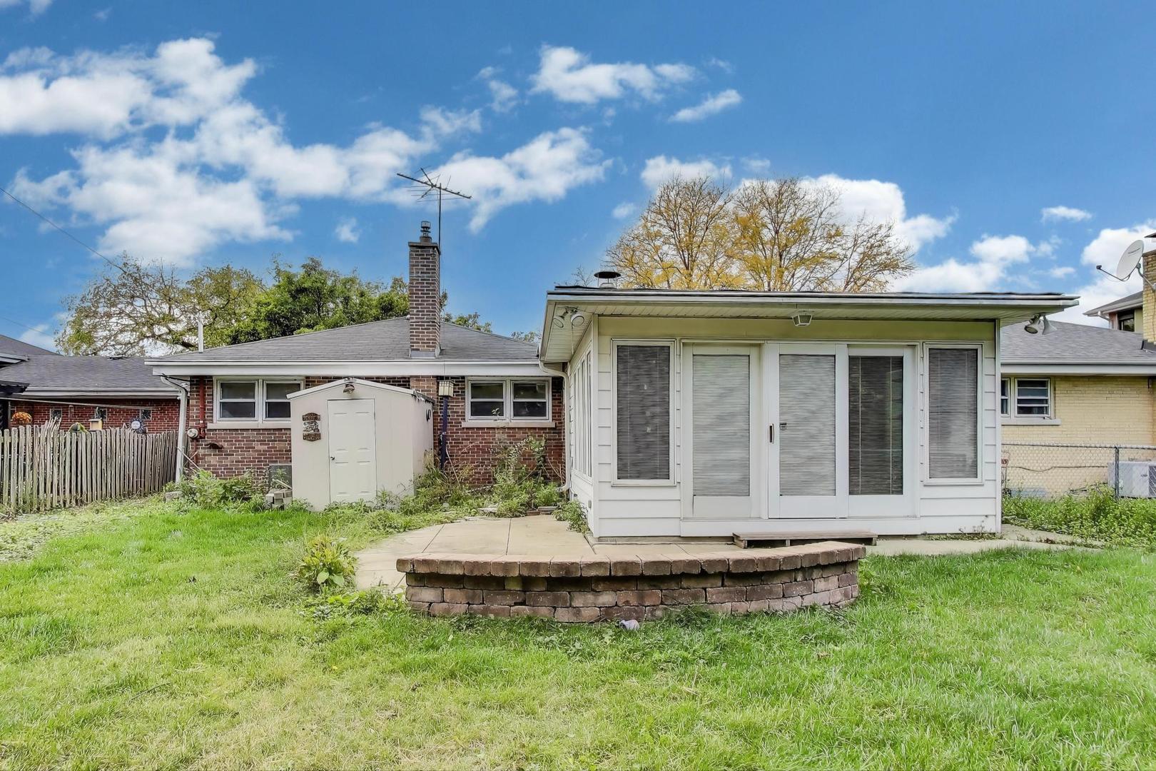507 North Hamlin Avenue Park Ridge, IL 60068 - Photo 24 of 30 a view of a house with a yard and sitting area
