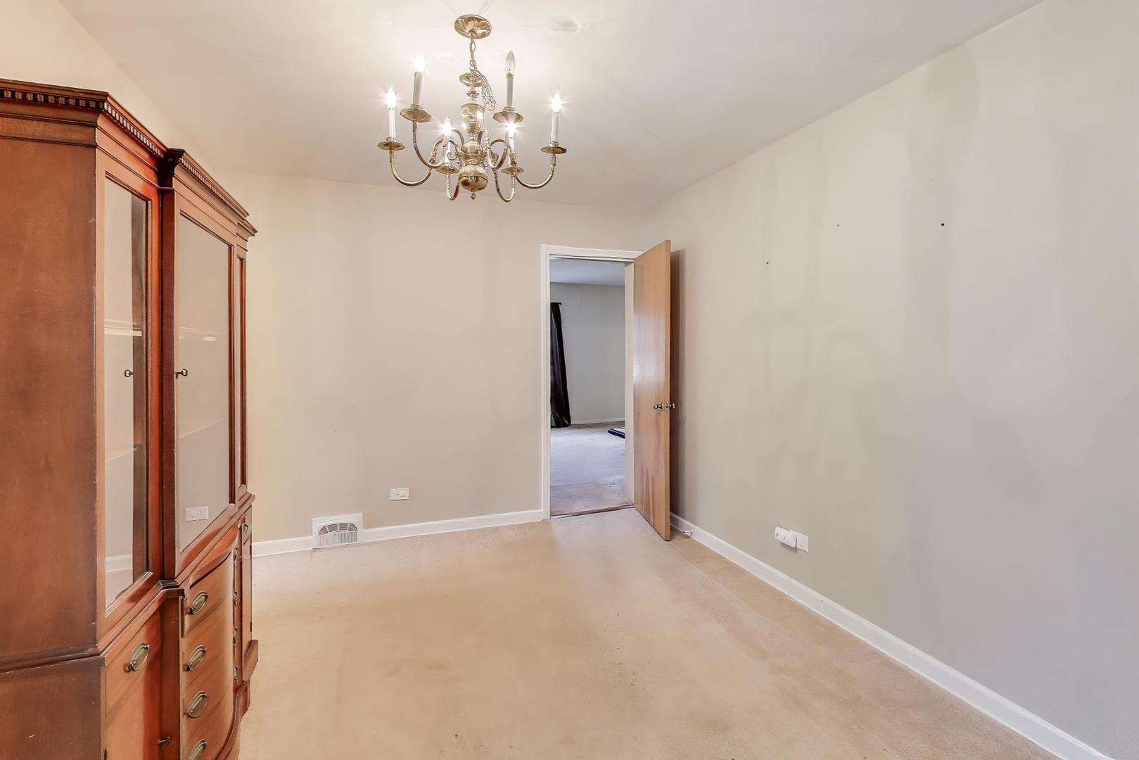 507 North Hamlin Avenue Park Ridge, IL 60068 - Photo 5 of 30 a view of a chandelier in big room and chandelier