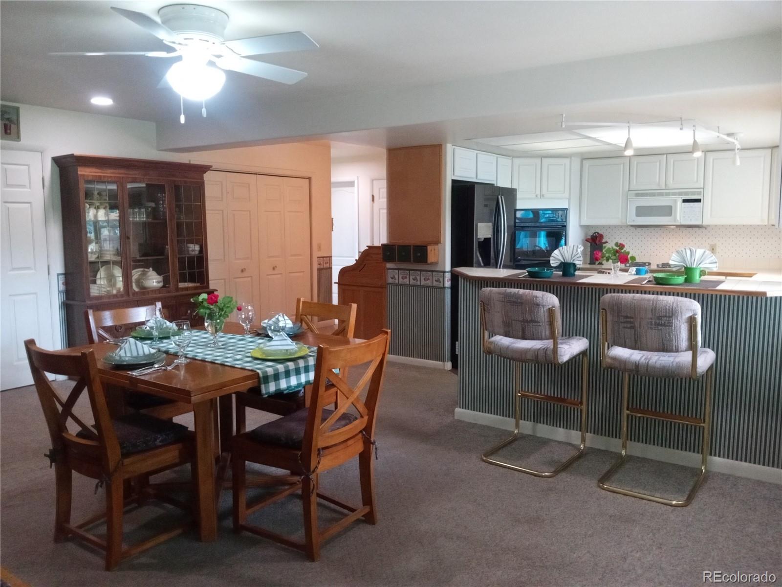 7150 South Platte Canyon Road Littleton, CO 80128 - Photo 20 of 37 a dining room with furniture and window