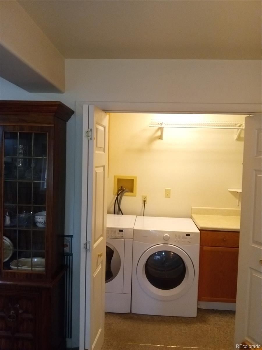 7150 South Platte Canyon Road Littleton, CO 80128 - Photo 25 of 37 a utility room with dryer and washer