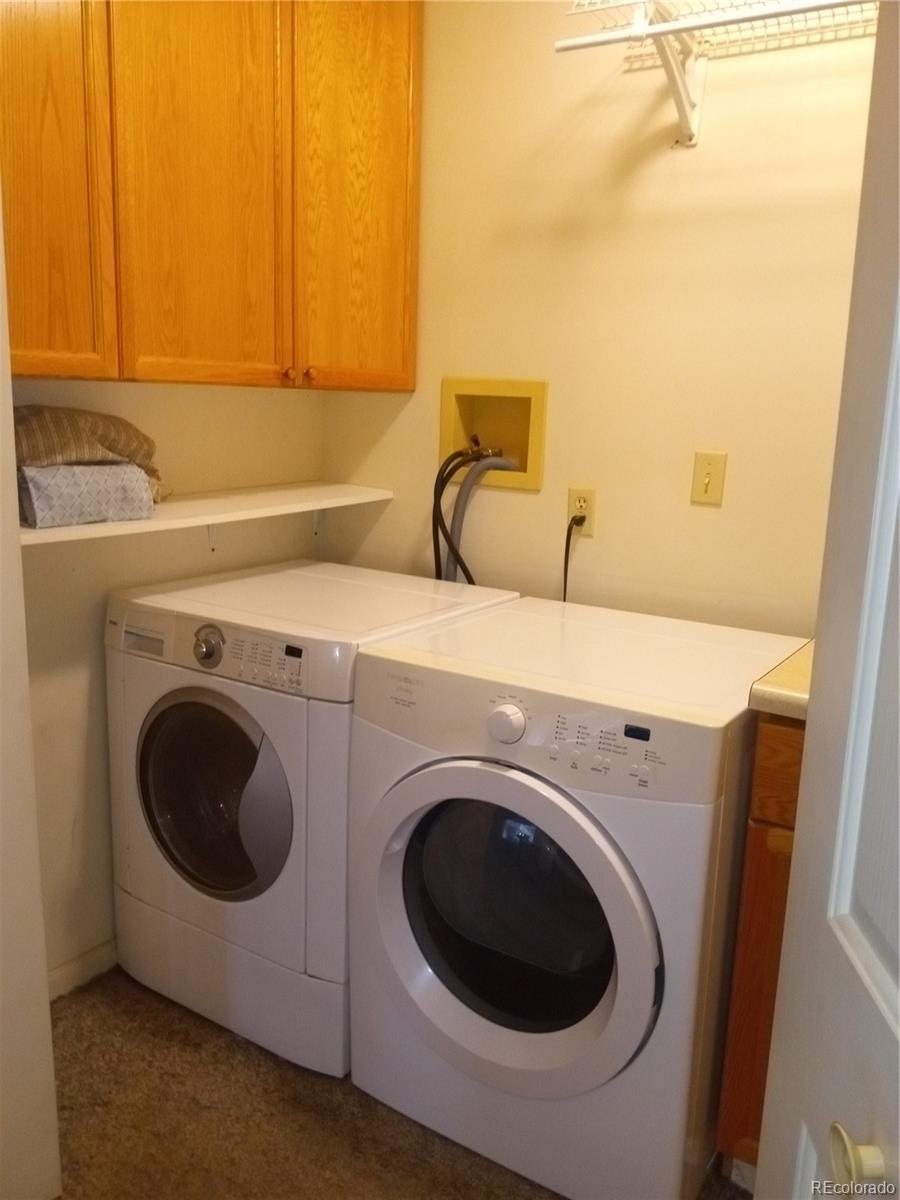 7150 South Platte Canyon Road Littleton, CO 80128 - Photo 26 of 37 a utility room with dryer and washer