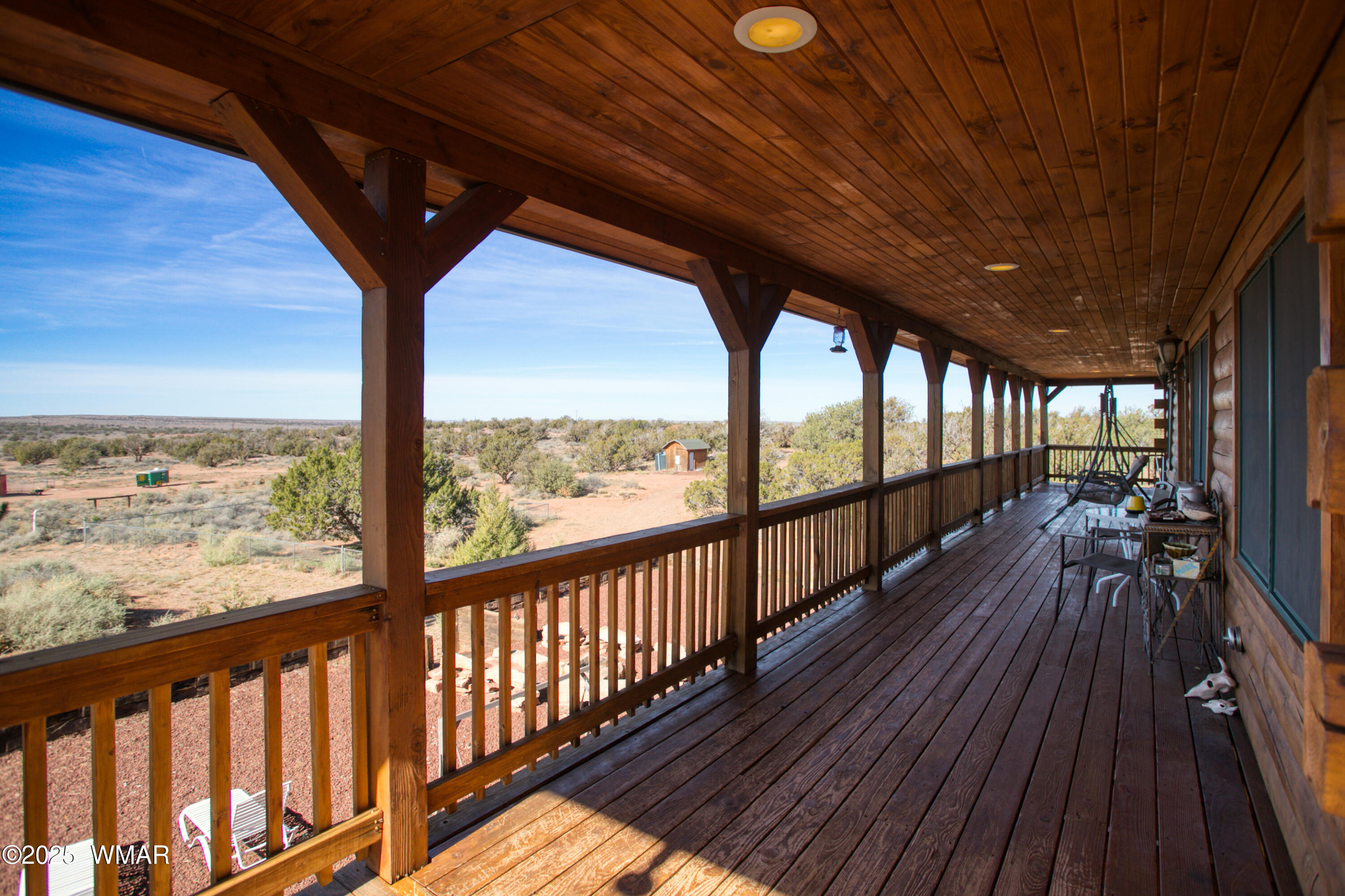 8555 Reata Lane Snowflake, AZ 85937 - Photo 77 of 88 a view of a balcony with wooden floor