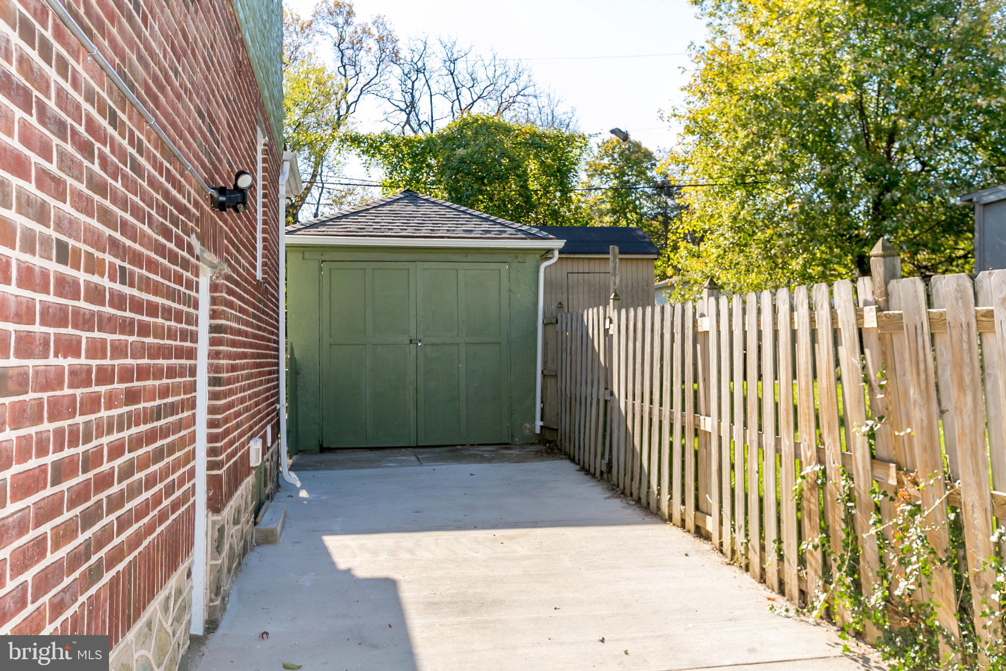 500 Kingston Road Baltimore, MD 21229 - Photo 32 of 32 Long driveway with one car garage