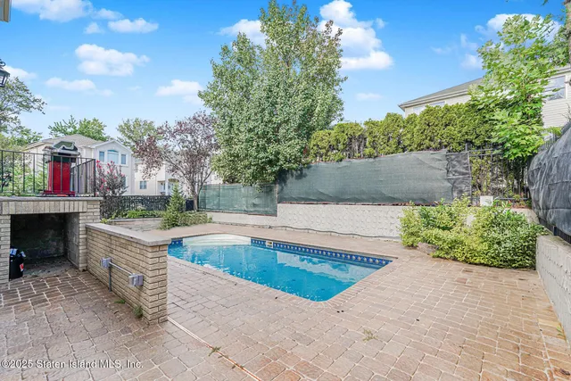 a view of outdoor space yard and swimming pool