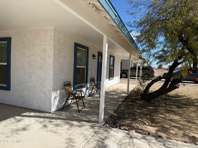 a view of a outdoor space with porch and patio